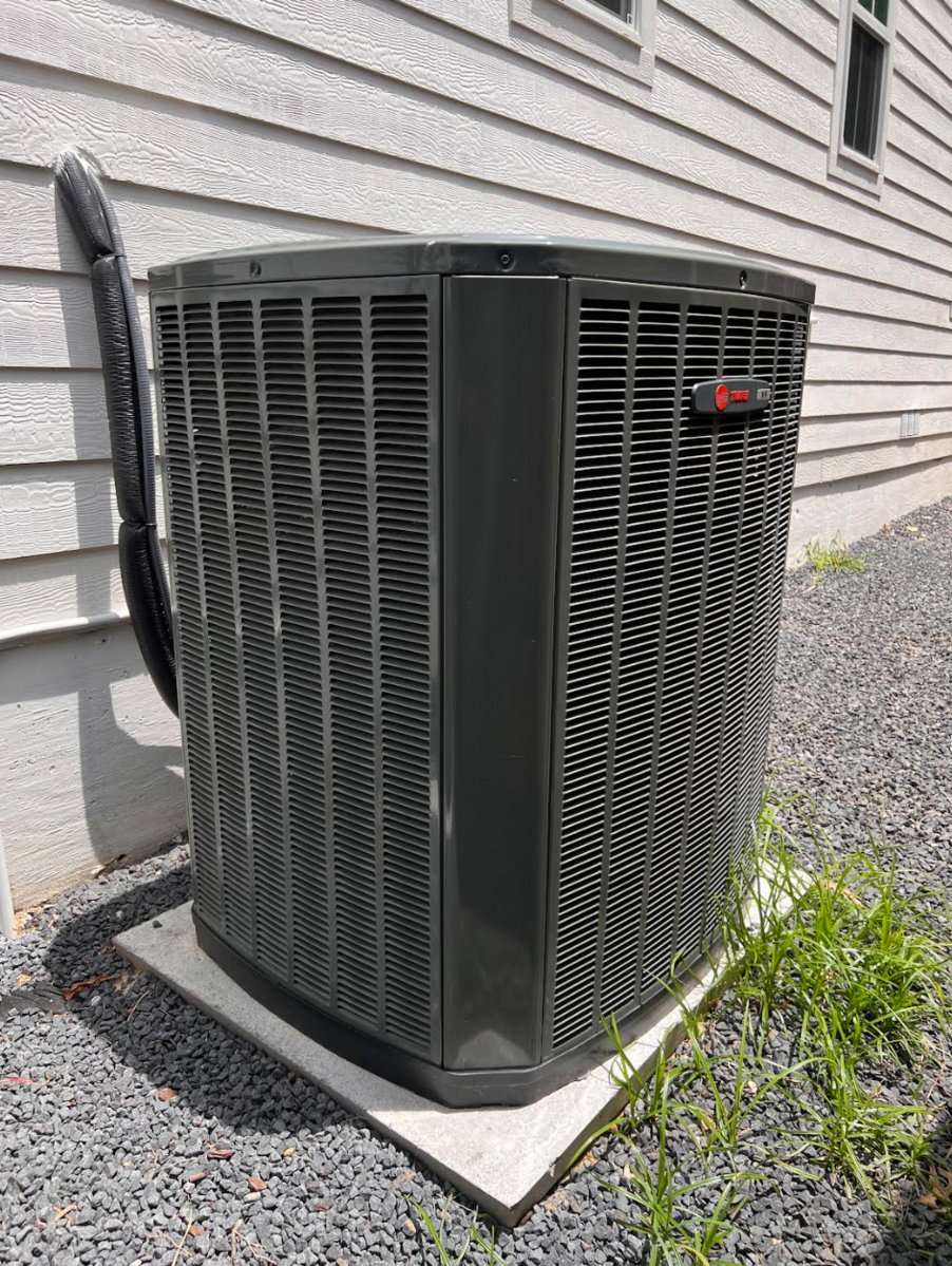 Close-up of outdoor HVAC condenser unit
